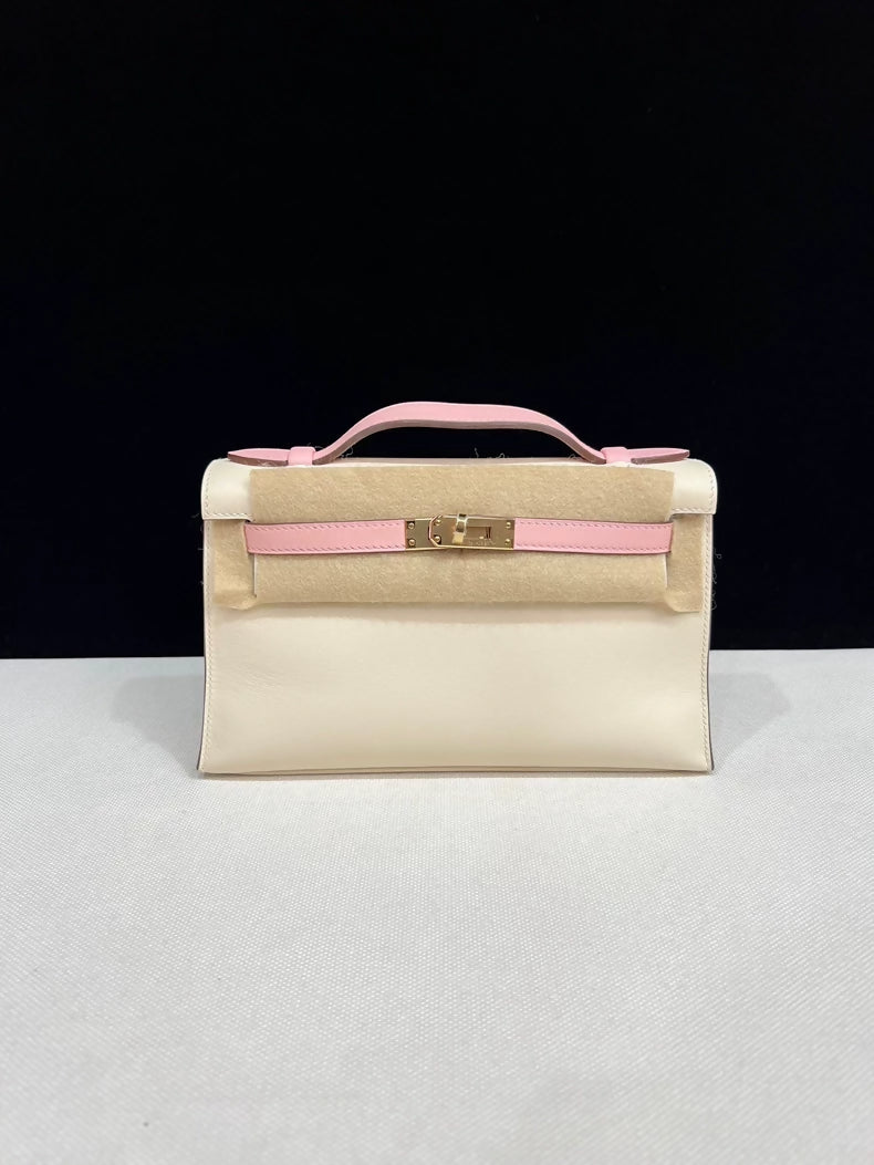 Hermes Kelly Pochette Craie & rose Sakura Pink Swift Leather with light gold hardware