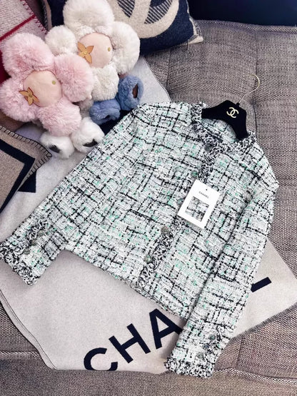 Chanel 26s green tweed jacket