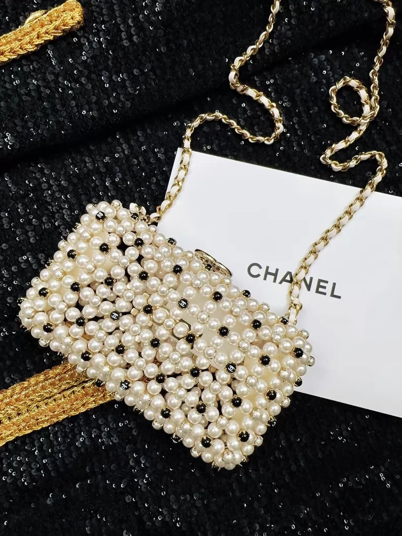 Chanel 23S black and white gold metallic pearls, chain bag