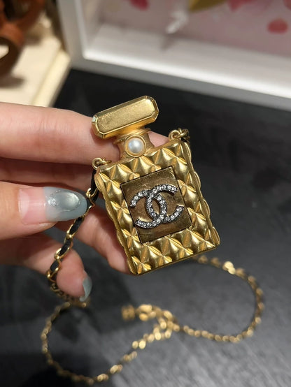 Chanel 22A gold quilted perfume bottle leather chain necklace
