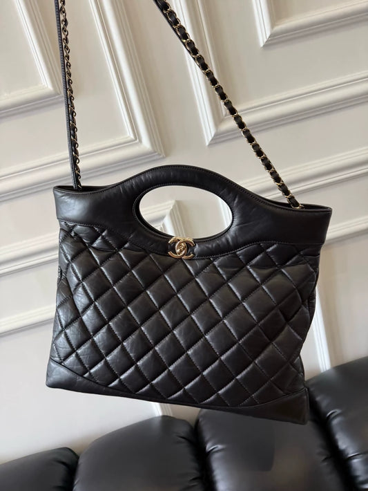 Chanel 23A black and gold calfskin 31 bag