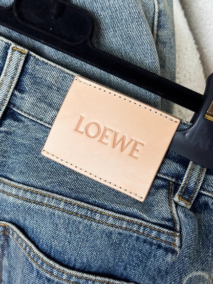 Loewe light blue washed distressed denim trousers