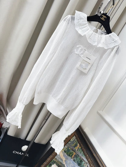 Chanel 25p white ruffle top