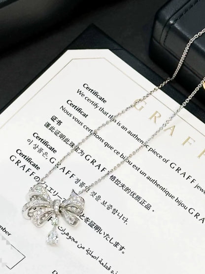 Tilda
s Bow Graff necklace in white gold 
diamonds