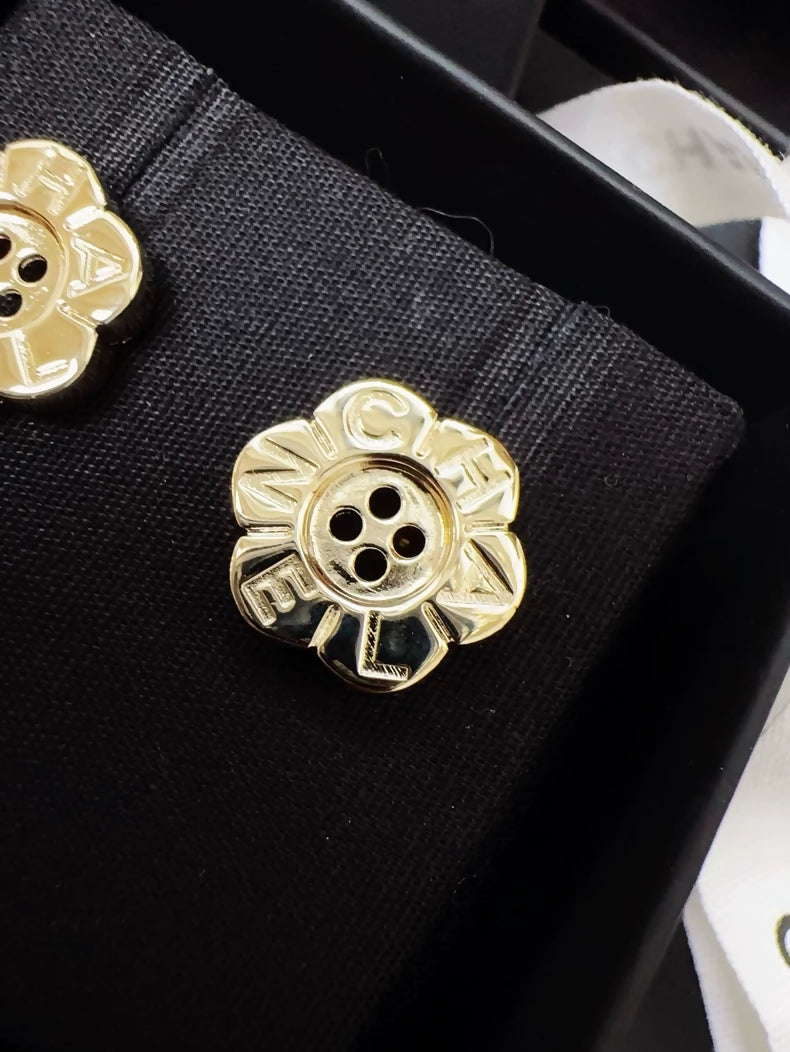Chanel 25K gold flower button earrings