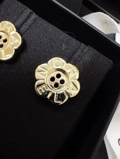 Chanel 25K gold flower button earrings