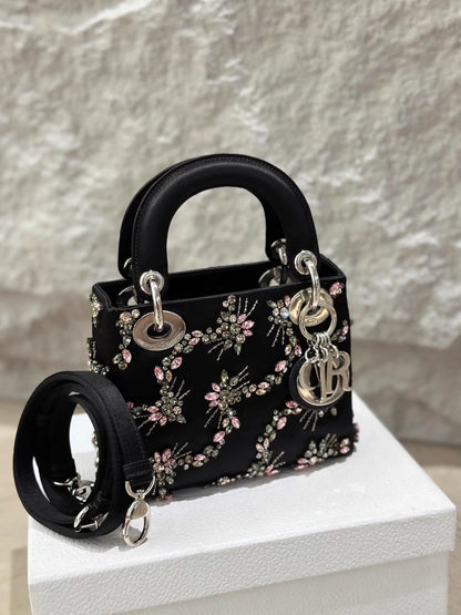 Lady Dior small black silk embroidery bag with silver hardware