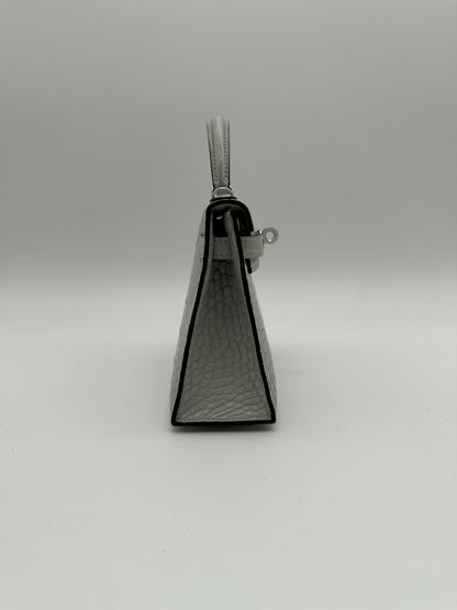 Hermès Kelly 20 Gris Neve Matte Alligator PHW K 2026