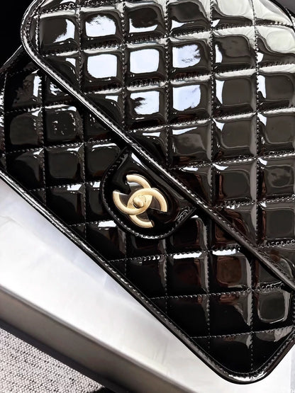 Chanel 22k black patent leather backpack