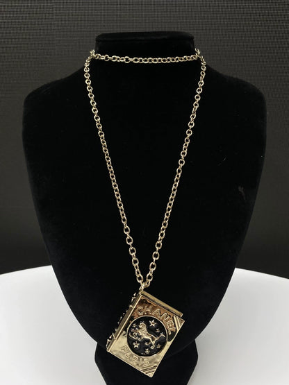 Chanel 22P lion magic book long necklace