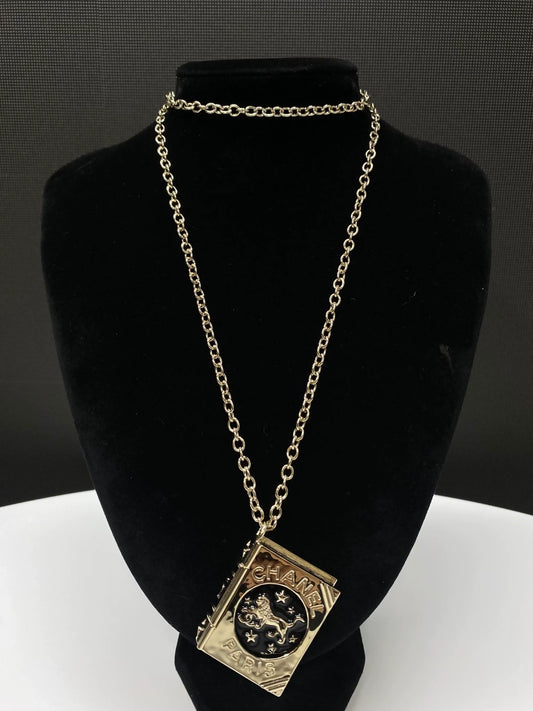 Chanel 22P lion magic book long necklace