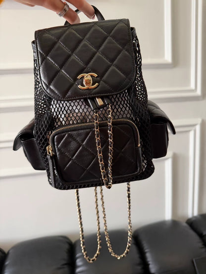 Chanel 25S black mesh backpack in gold hardware