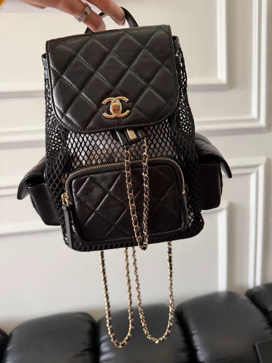 Chanel 25S black mesh backpack in gold hardware