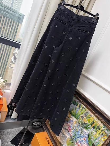 Chanel 23K embossed camellia black wide-leg jeans