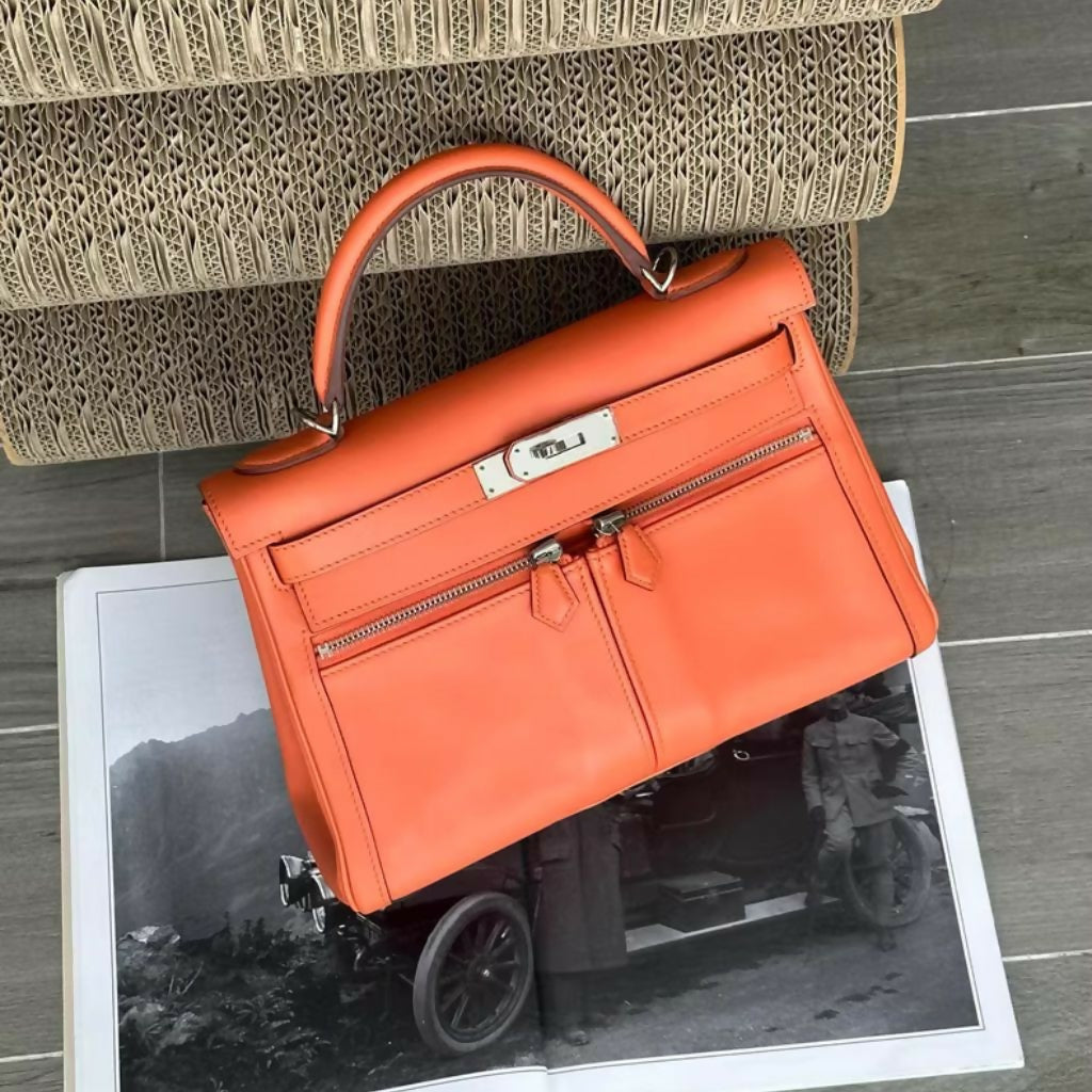 Hermès Kelly 28 Lakis orange swift leather palladium hardware