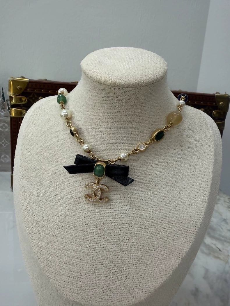 Chanel Pearl Leather Bow Necklace