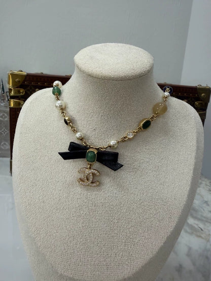 Chanel Pearl Leather Bow Necklace