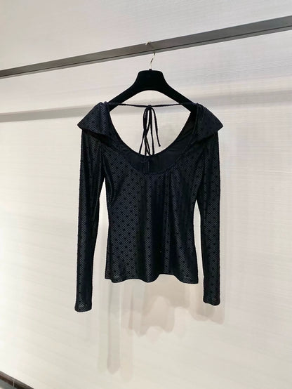 Chanel 24B black top with ruffles