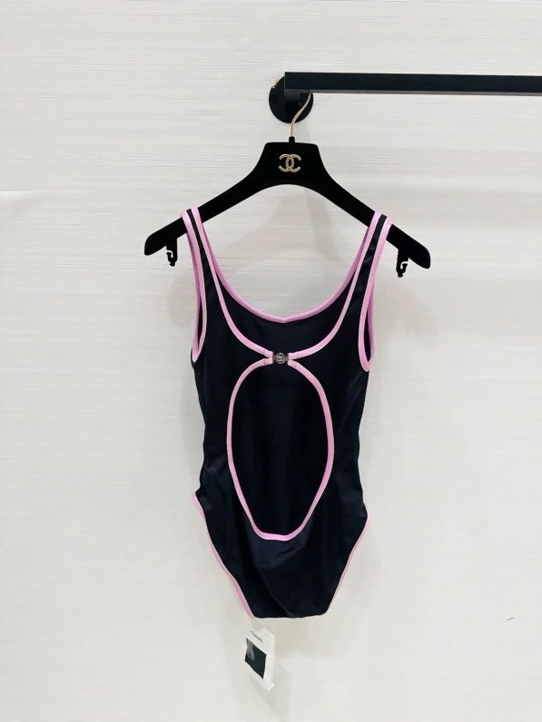Chanel 25m Coco Beach collection pink-trimmed swimsuit