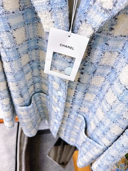 Chanel 22B blue and white sequined check tweed jacket