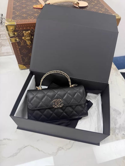Chanel 25S black leather top handle bag gold hardware