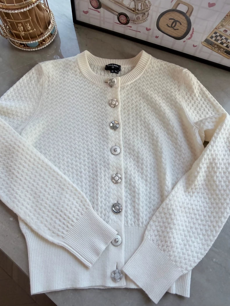 Chanel 24A white cashmere cardigan with charms buttons
