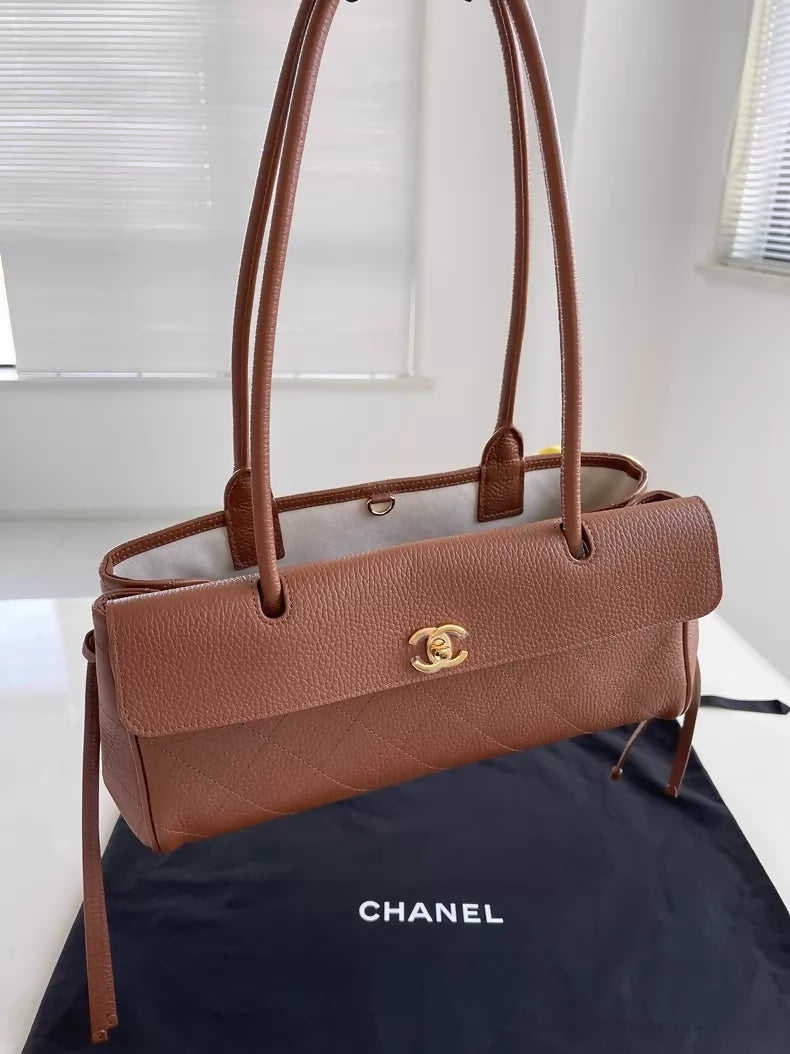 Chanel 2026 baguette bag in brown grained calfskin