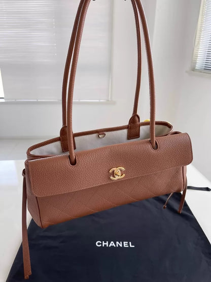 Chanel 2026 baguette bag in brown grained calfskin