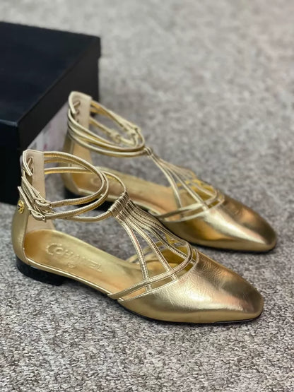 Chanel Karl Lagerfeld gold shoes