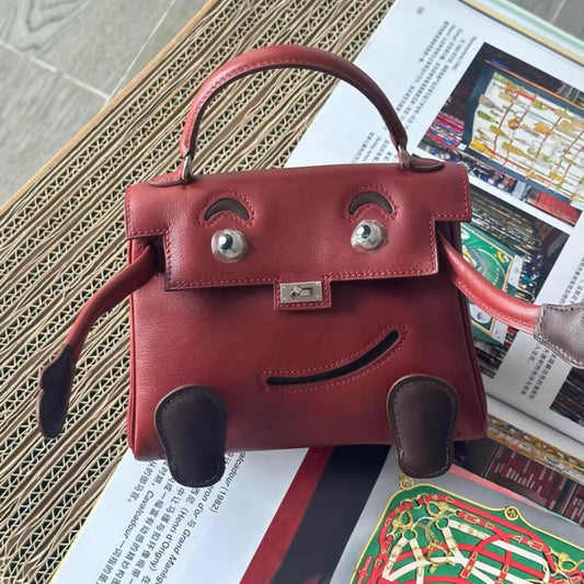 Hermès Kelly Doll in Rouge H Swift Leather with palladium Hardware