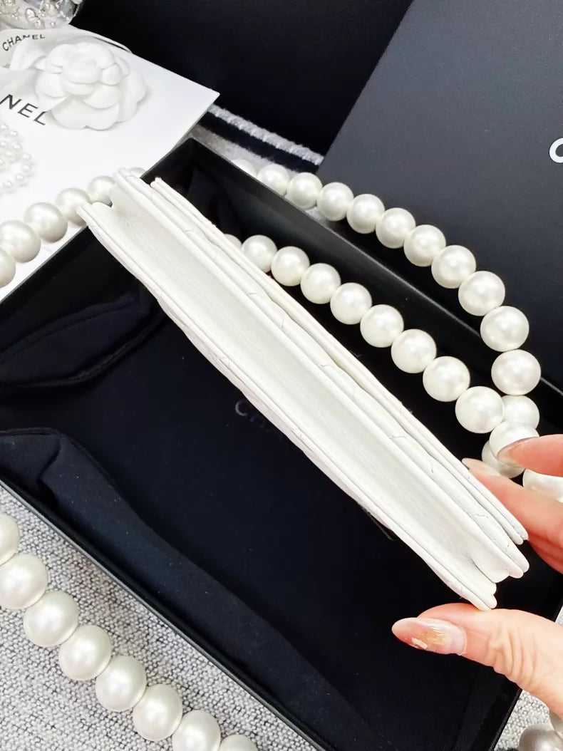 Chanel 20k ecru gold pearl chain WOC shoulder bag