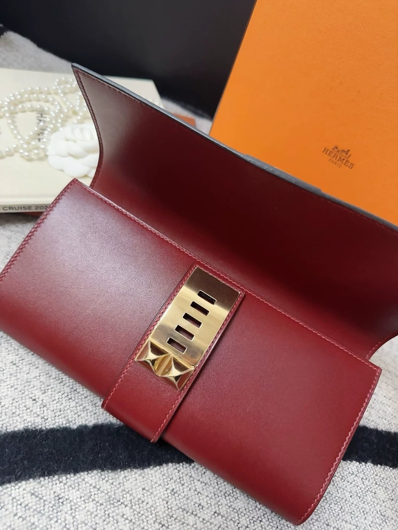 Hermes red Medor clutch gold hardware