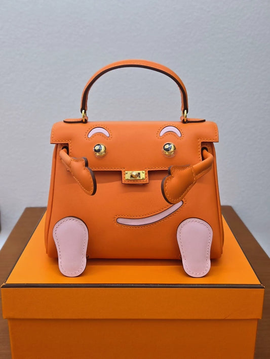Hermès Kelly Doll orange, Sakura pink, Swift leather gold hardware