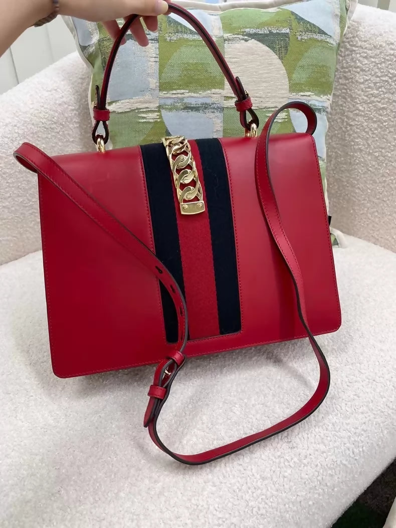 Gucci Sylvie Serbian large handbag in red and gold
