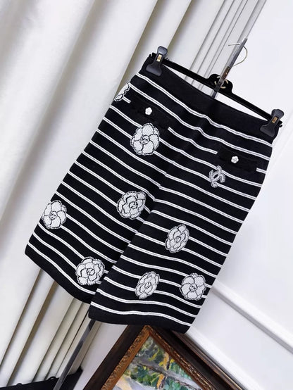 Chanel 23k black and white striped camellia double C logo knit shorts