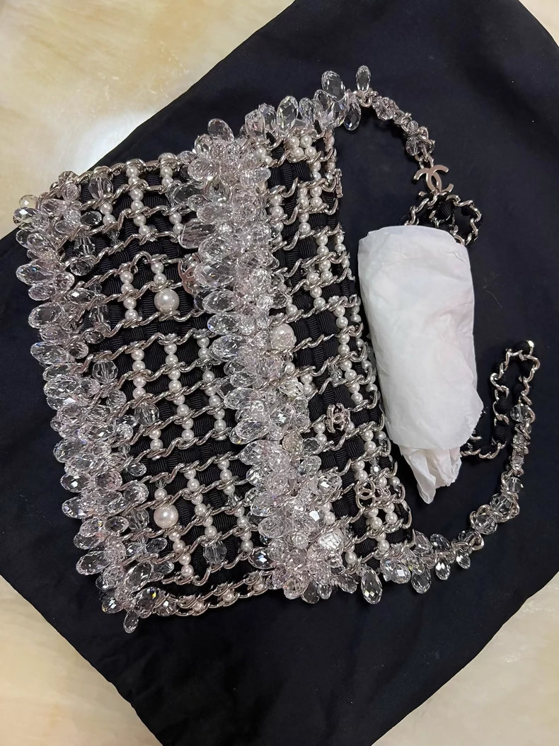 Chanel 19K Black and white tweed chain clutch bag
