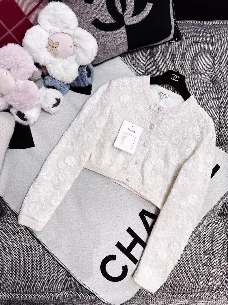 Chanel 21S  off-white knit cardigan with heavy embroidery, sequined camellia