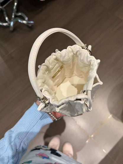 Chanel 25A mini pleated bucket bag