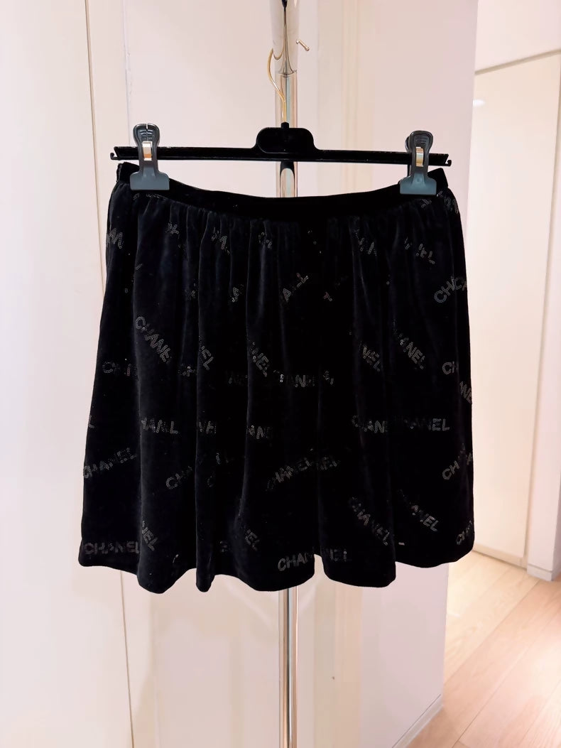 Chanel 22B Black Sequined Logo Bow Skirt