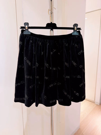 Chanel 22B Black Sequined Logo Bow Skirt