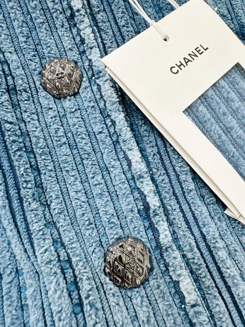 Chanel 25K blue jacket with stripes and sequins