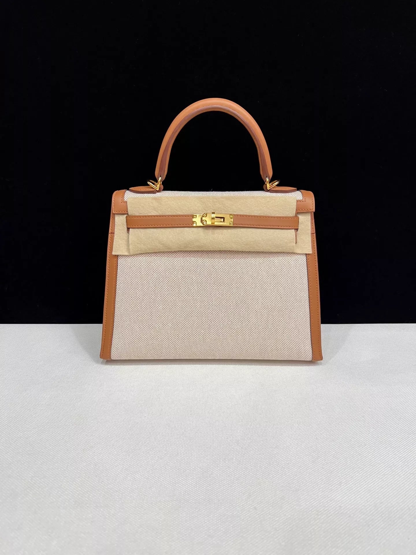 Hermes Kelly 25 Canvas with gold/brown swift leather and gold hardware