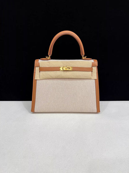 Hermes Kelly 25 Canvas with gold/brown swift leather and gold hardware