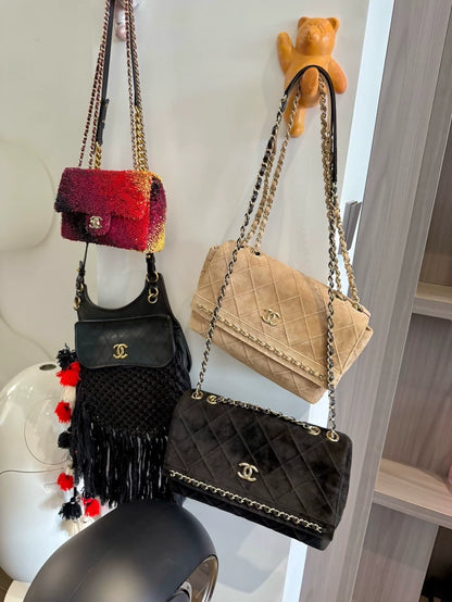 Chanel Black and gold leather chain with suede trim