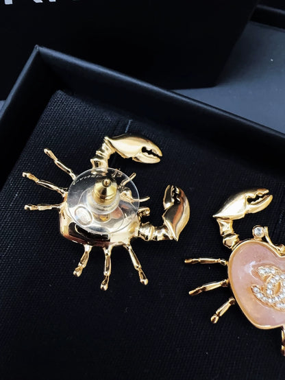 Chanel 25c ocean crab earrings