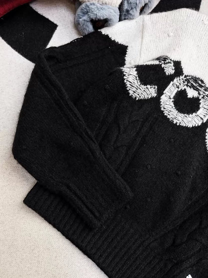 Chanel Coco Neige Ski Collection Black and White Knit Sweater with Coco Logo