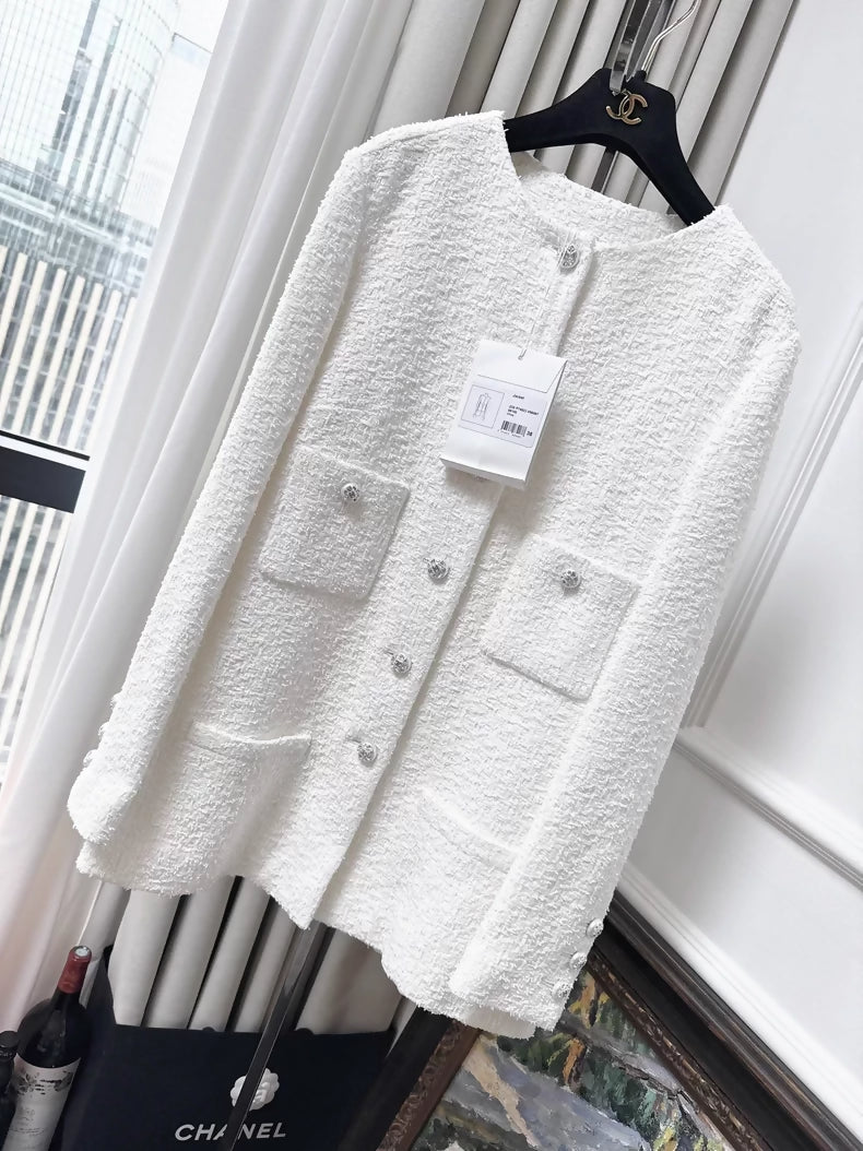 Chanel 23s jacket in white tweed with rhinestone buttons