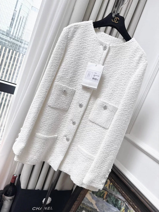 Chanel 23s jacket in white tweed with rhinestone buttons