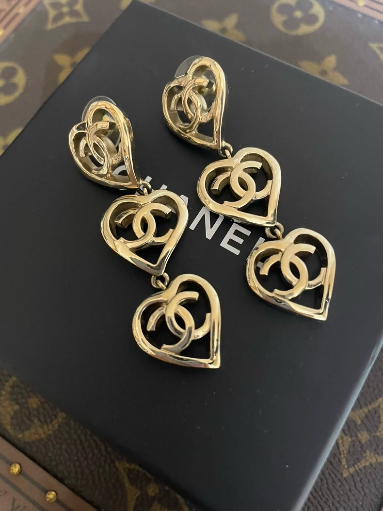 Chanel heart-shaped gold long earrings
