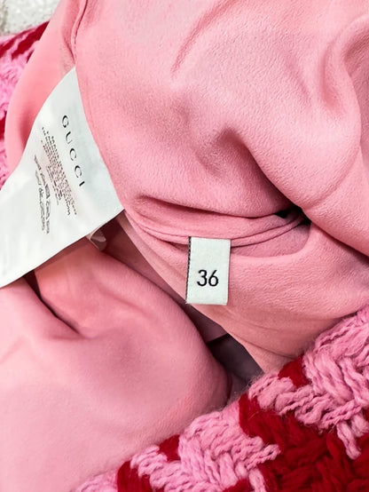 Gucci coat in pink houndstooth fabric with purple fur collar